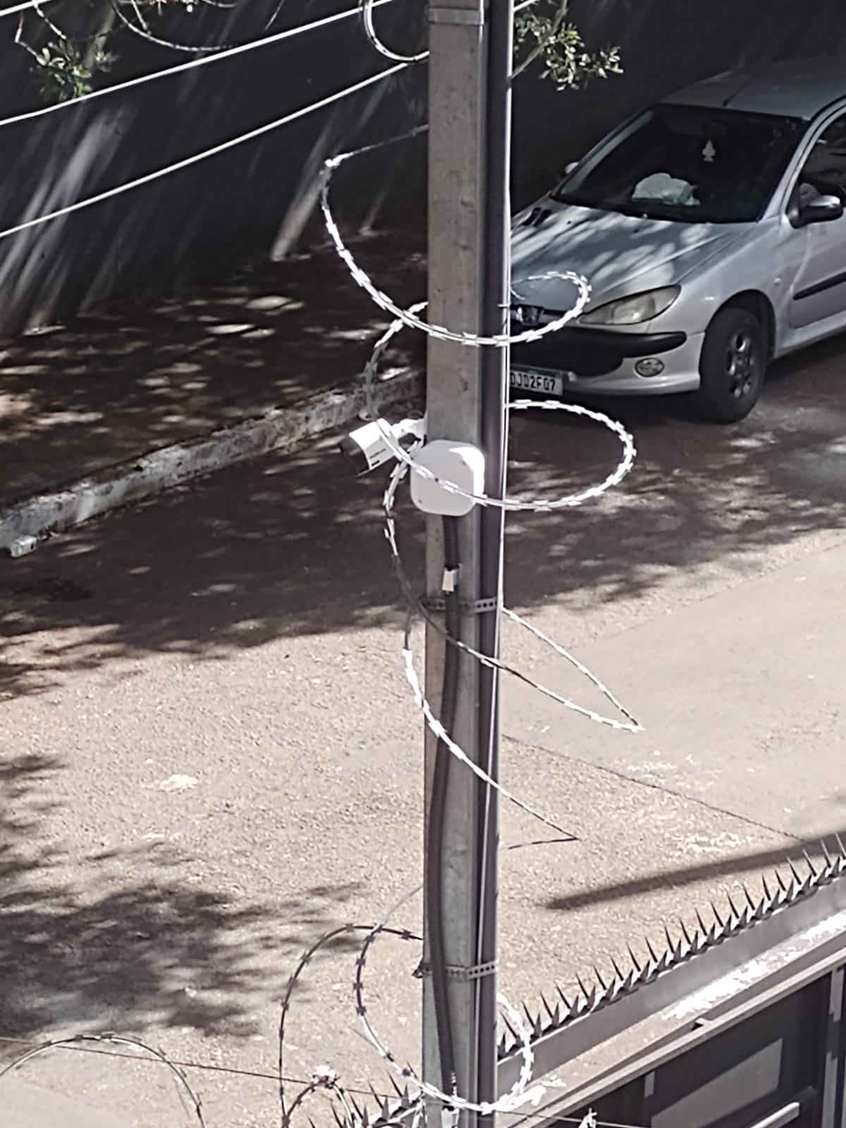 Instalação de câmera em poste — equipe G2 Solution